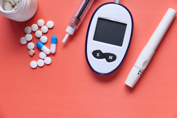  blood sugar measurement for diabetes, pills, and stethoscope 