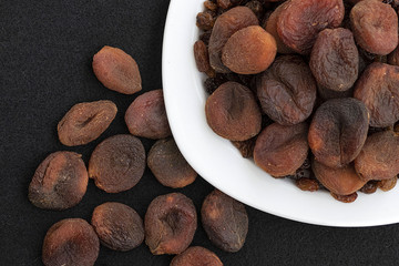famous turkish dried apricots, sun dried apricots, malatya apricots, dried apricots, dried apricots on the plate,