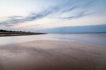 Sunset on the beach in Mediterranean Sea