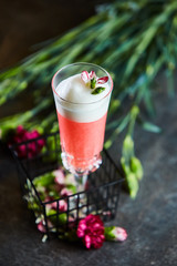 Blushing cranberry cocktail in a glass
