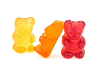 Colored sweet jelly marmalade teddy bears isolated on white background. Gummy bears. © domnitsky