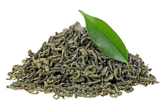 Dry green tea with fresh tea leaf isolated on a white background. Food and ingredients concept.