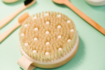 Cosmetic sours for the body, against a mint background.