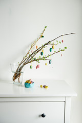 twigs decorated ccolors eggs