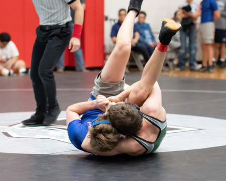 High School boys wrestling in a competitive match