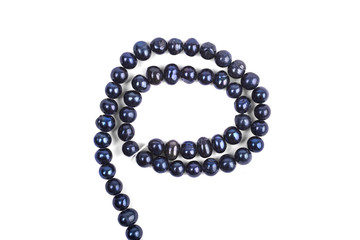Blue pearl beads isolated on a white background
