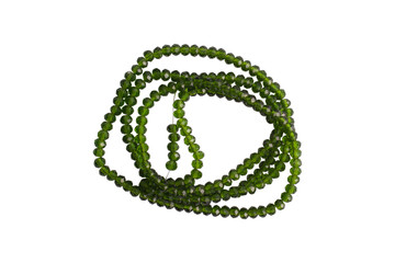 Obraz premium Green stone beads isolated on a white background