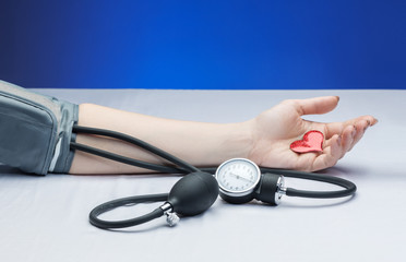 tonometer measures the pressure of woman a doctor appointment