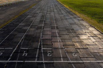 Running track texture with lane numbers, Running track background