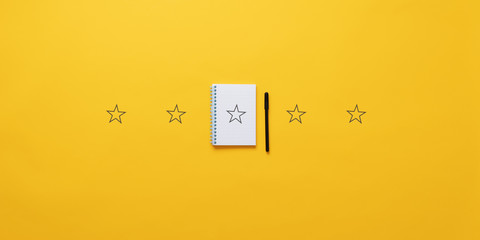 Five stars over yellow background