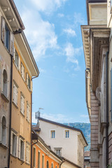Fototapeta na wymiar Colorful Houses and Facades in Trento - Trento Italy; Blue Sky in the Background