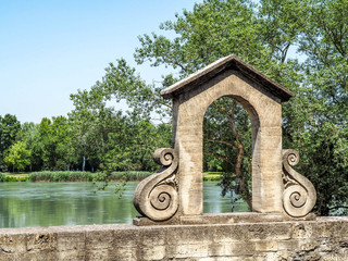 Pont Saint-Benezet or pont de Avignon is the famous bridge adjoining the Palais des Popes in Avignon