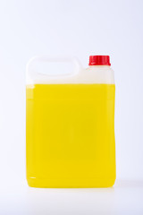 Plastic canister with pen and red cap, yellow liquid, mock up object, isolated on white background.