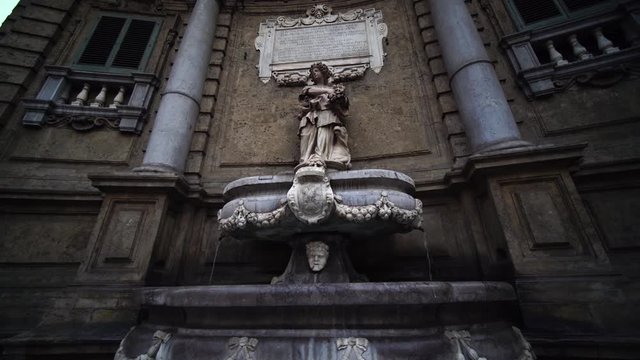Piazza Pretoria fountain sculptures. Palermo, Sicily, Italy. Summer tourism landmark & family travel destination in Europe.