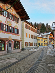 Fototapeta na wymiar Cozy street with lovingly painted facades of the houses
