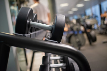 Obraz na płótnie Canvas Dumbbell on stand in a gym