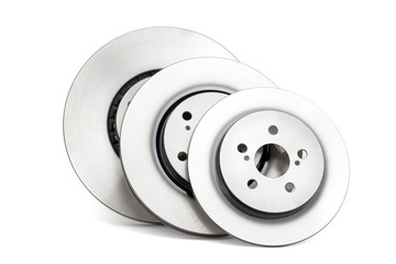 several different types of brake discs on a white background