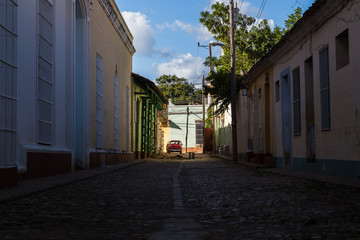 Looking up a shady street in Trinidad