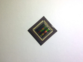 Close up of cmos sensor ccd sensor camera sensor macro shot on white background.