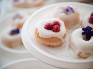 donuts with flowers and fruit