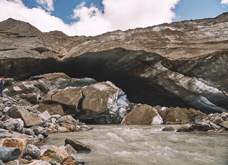 The spring of Inguri river under melting Shkhara glacier in Caucasus