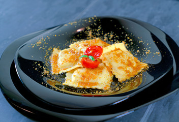 grouper ravioli with bottarga and cherry tomatoes