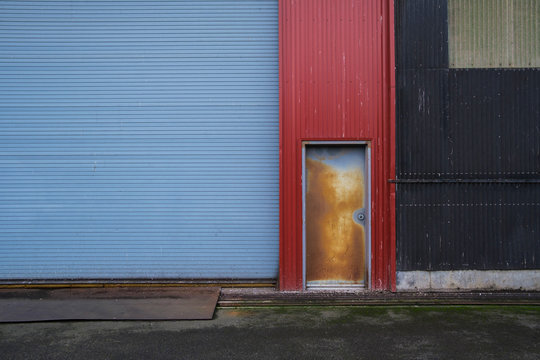 Colorfully painted warehouse exterior, doorway and loading area, Seattle, Washington,Seattle