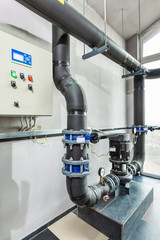 interior of an industrial boiler house, technological unit with many sensors, indicators and valves
