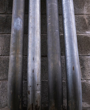 Metal piping against building wall,Seattle