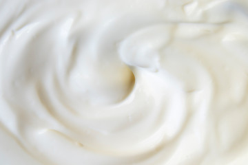 White texture background, sour cream.