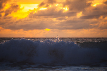 Magical dramatic sunset on a tropical beach.