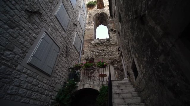 Split Old Town, Croatia. Old street inside Diocletian's Palace. Travel destination for tourist visiting Croatia. Europe summer tourism.