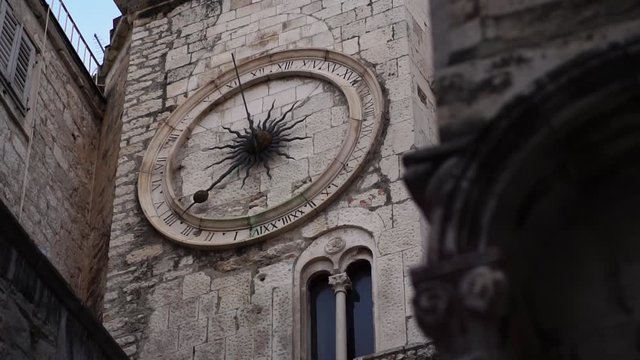 Tower clock. Diocletian's Palace. Split Old Town, Croatia. Travel destination for tourist visiting Croatia. Europe summer tourism.