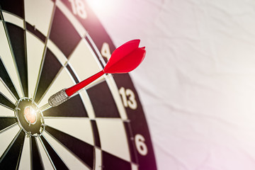 Background with symbol concept of business success achievement focus with red dart game aim and hit...