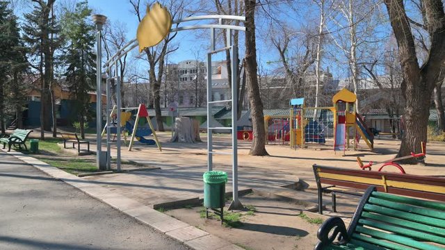 Empty children playground in cathedral square park in the center of Chisinau, Moldova during state of emergency by the reason of covid-19 virus threat