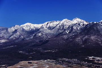 Obraz na płótnie Canvas 入笠山から　冬の八ヶ岳連峰　南八ヶ岳　硫黄岳、横岳、阿弥陀岳、赤岳