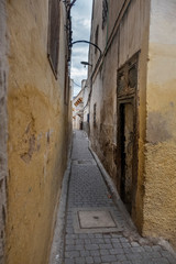 Fototapeta na wymiar Alley in Old Town of Fes, Morocco