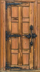 Close-up old wooden door locked
