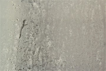 Abstract bathroom glass from warm water shower. photo 