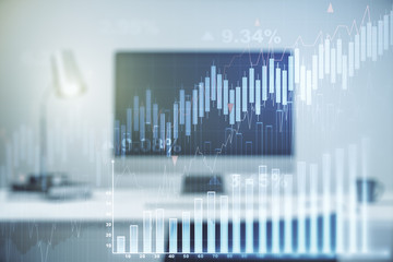 Abstract creative financial graph on modern laptop background, forex and investment concept....