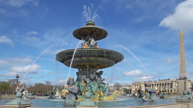 The Maritime Fountain with Luxor Obelisk in the background at the place de la Concorde - Paris, France