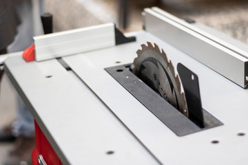 The saw bench close-up is new and unused. It is used in the carpentry profession.