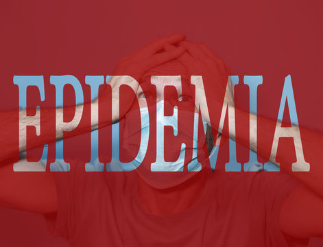 Text EPIDEMIA on red background. man in protective medical mask screams in horror. hild with flu, influenza or cold protected from viruses among patients with coronavirus.