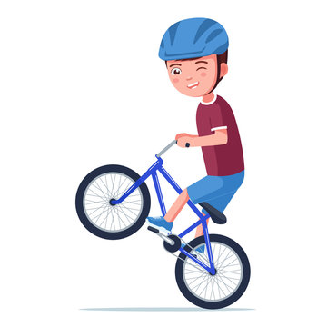 Boy rides a bmx bike on the rear wheel