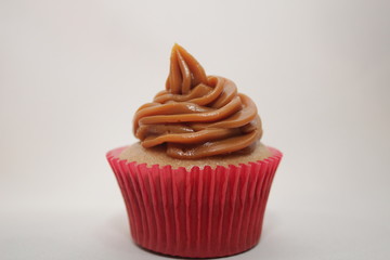 Churros cupcake in a white background
