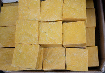 Solid soaps in different colors and flavors close-up.