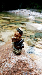 tower of stones in the water