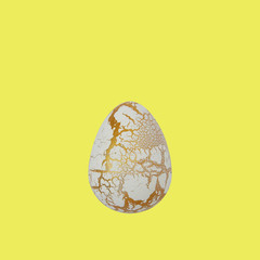 Easter egg isolated on a yellow