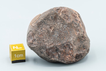 Chondrite Meteorite L6W2 Type isolated, piece of rock formed as an asteroid in the universe at during Solar System creation. The meteorite comes from an asteroid fall impacting Earth at Atacama Desert