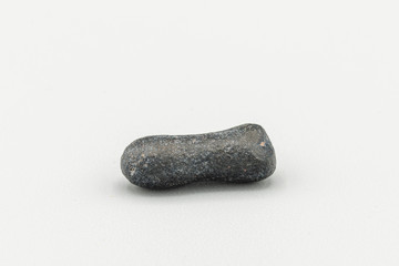 Black magnetic Atacaimite Tektite Meteorite isolated, a rock formed in a big meteorite collision at...